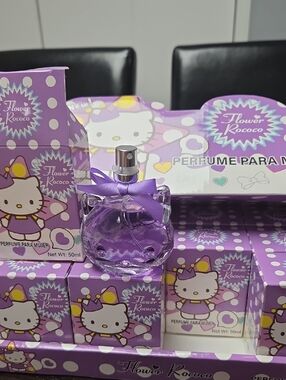Hello Kitty Lavender Floral Perfume Bottle with Purple Bow Or 2 For 25.00.